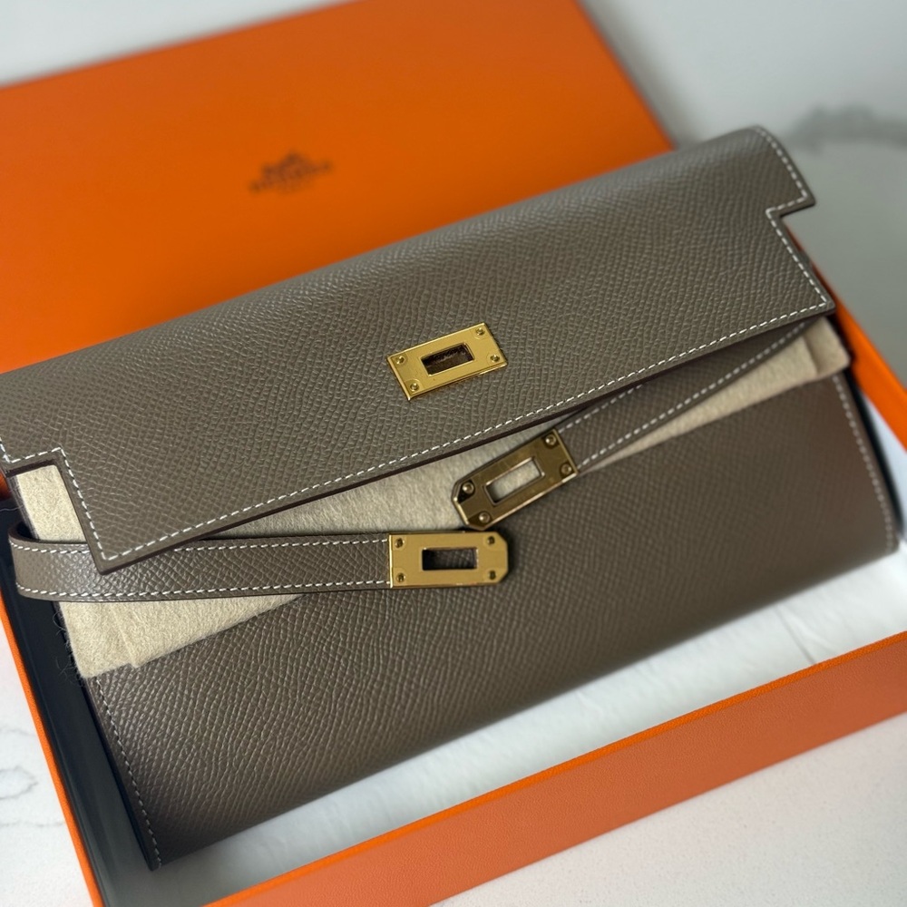 Hermès Taupe Leather Clutch